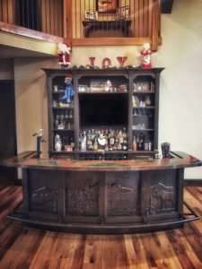 refined mountain lodge cabin bar with wilderness decor