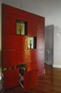 textured high-gloss lacquered storage cabinet wall