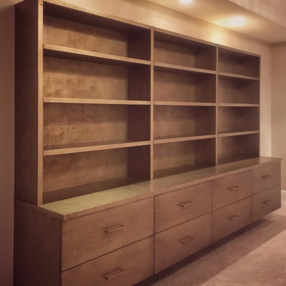 contemporary floating wall unit with a textured silver-gold finish