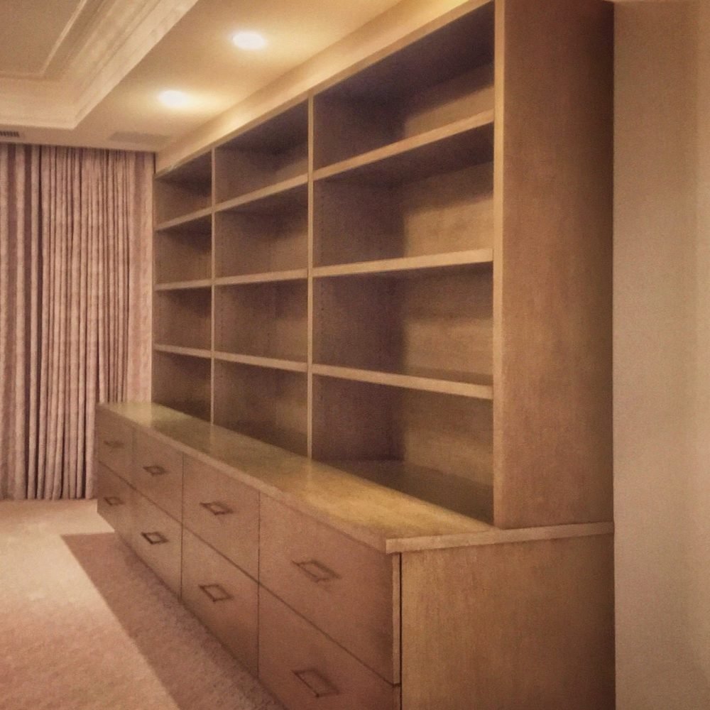 contemporary floating wall unit with a textured silver-gold finish
