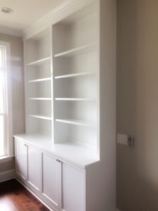 shaker-style wall storage unit with crisp white finish