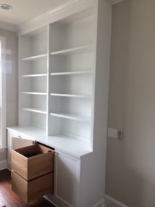 shaker-style wall storage unit with crisp white finish