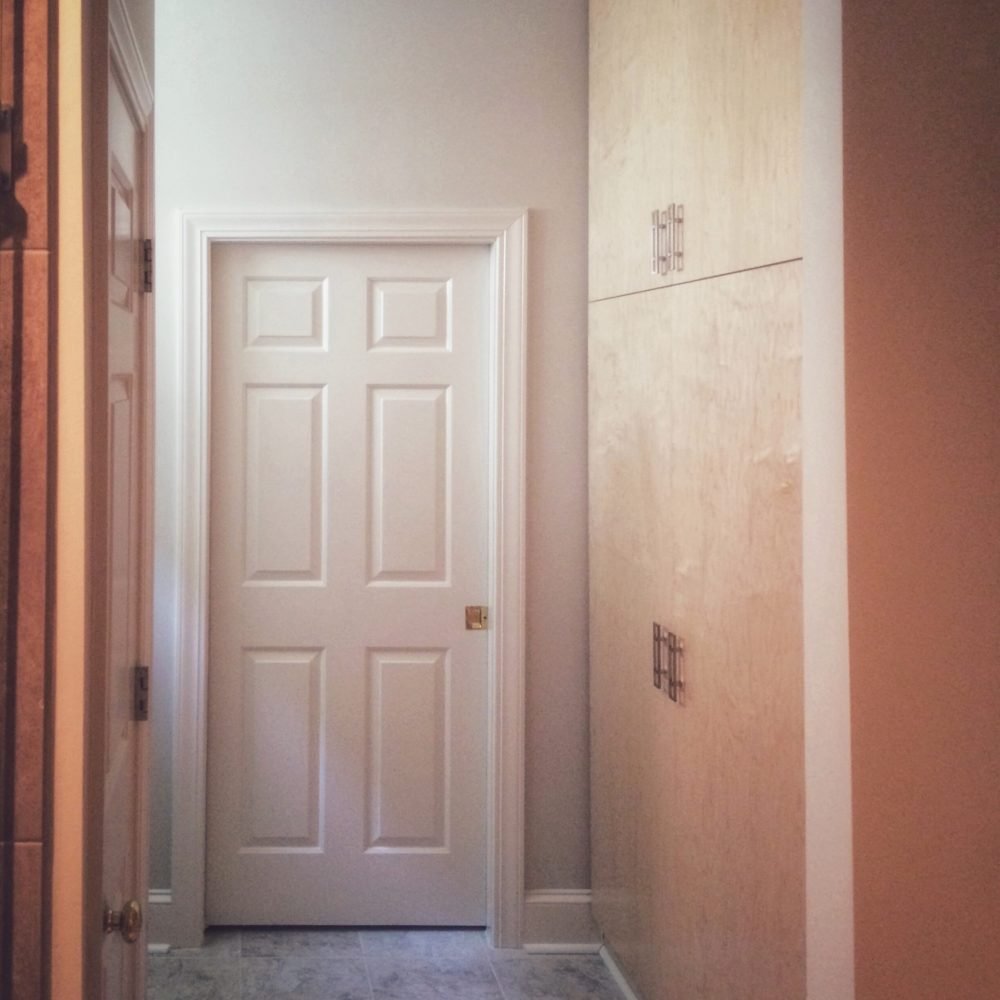 flat paneled storage pantry cabinet