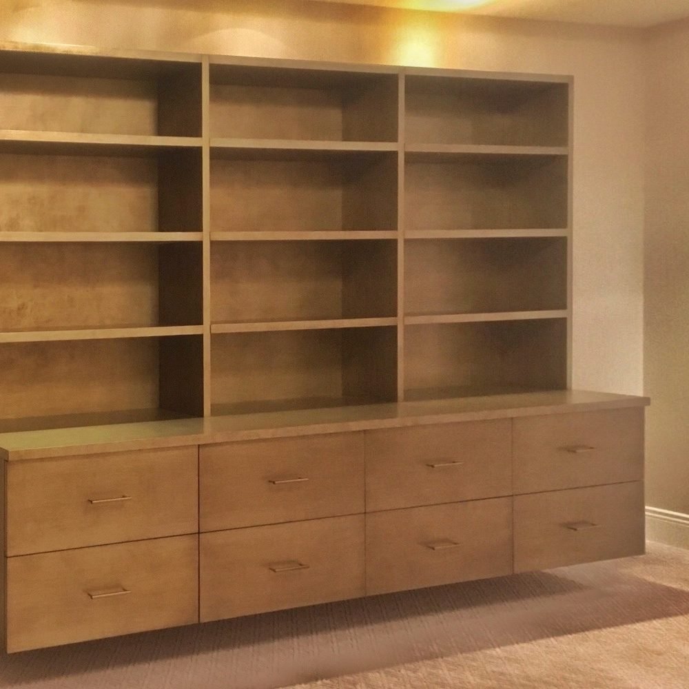 contemporary floating wall unit with a textured silver-gold finish