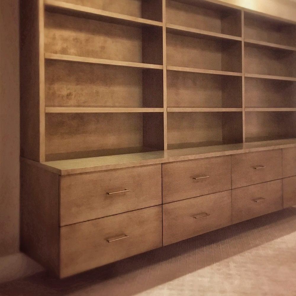 contemporary floating wall unit with textured silver-gold finish