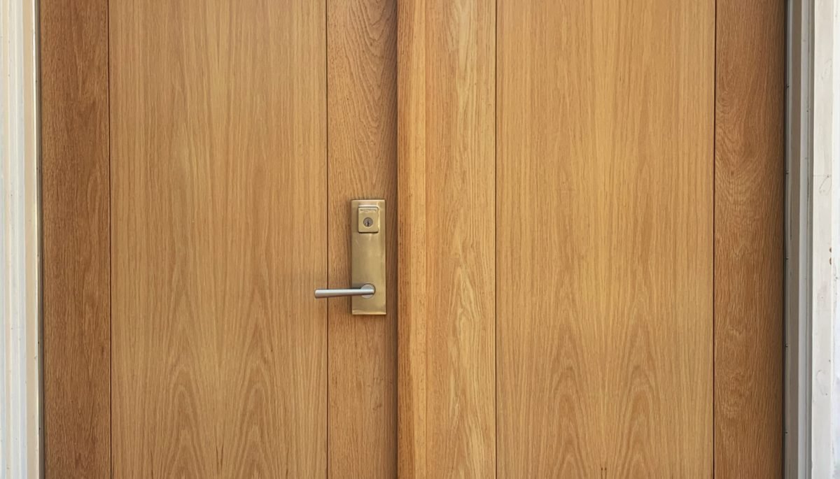 white oak entrance doors with double insulated flat panel