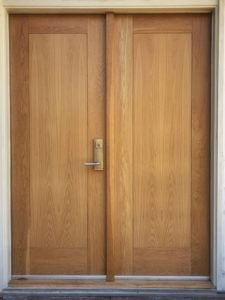 white oak entrance doors with double insulated flat panel