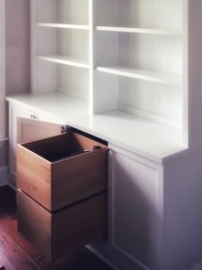 shaker-style wall storage unit with crisp white finish